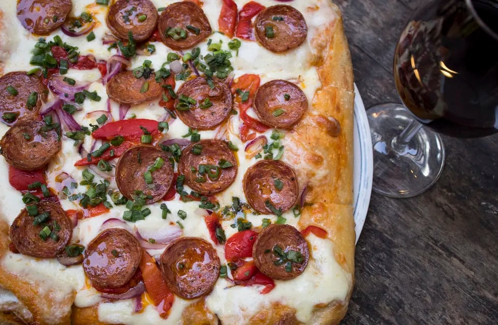 La pizza y el vino pueden ser una perfecta combinación. - Gentileza