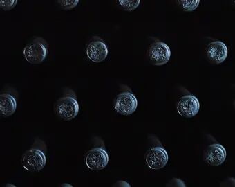 Para qué sirven las fundas en las botellas de vino