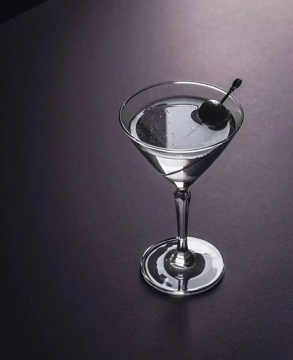 El Martini original, con ginebra, vermut y un topping. -Imagen web. 